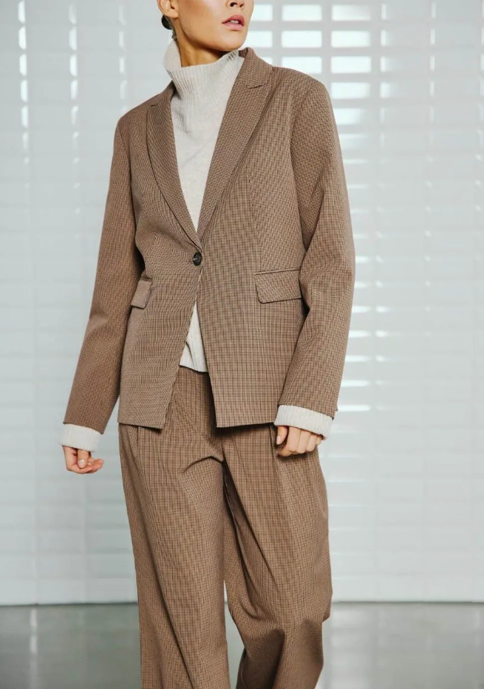 WITH BLACK BLAZER